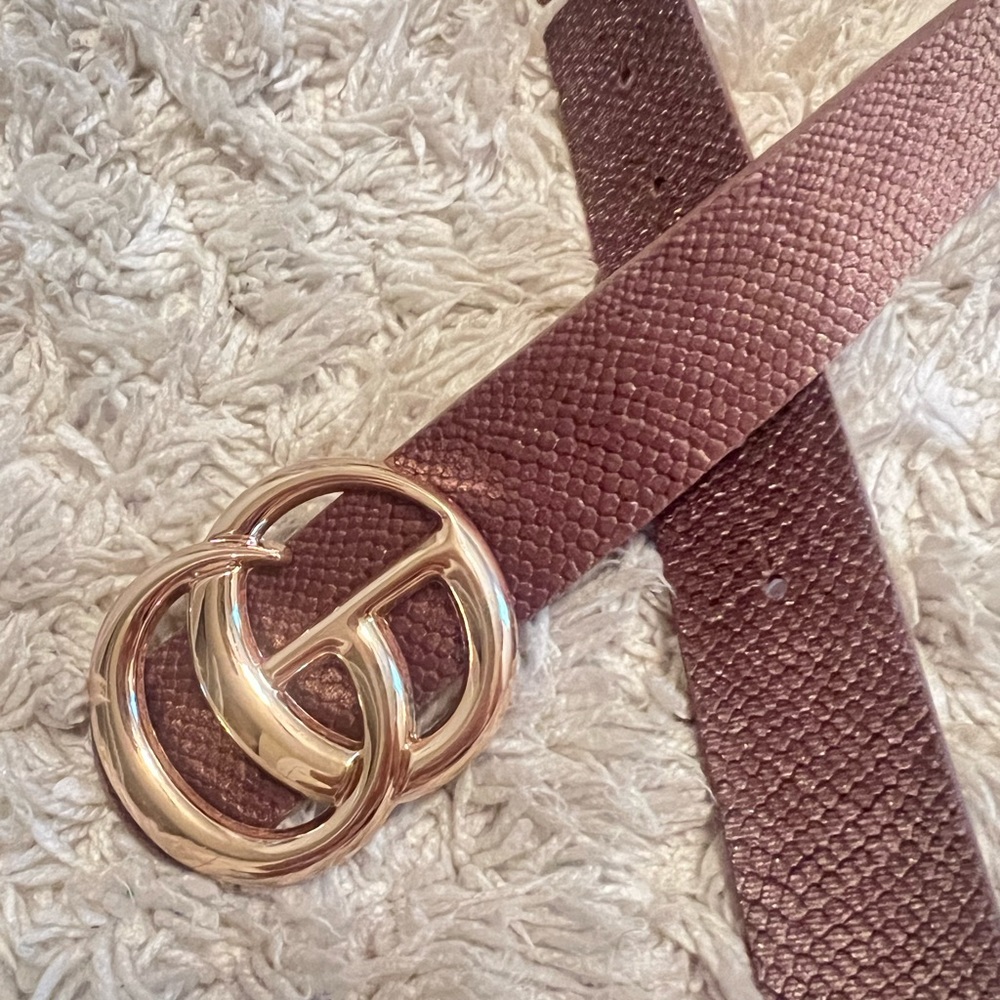 purple boutique belt with gold buckle